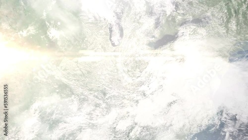 Earth zoom in from outer space to city. Zooming on Greenwood, Indiana, USA. The animation continues by zoom out through clouds and atmosphere into space. Images from NASA photo