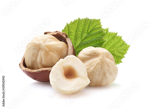 Hazelnuts kernel with leaves on white background