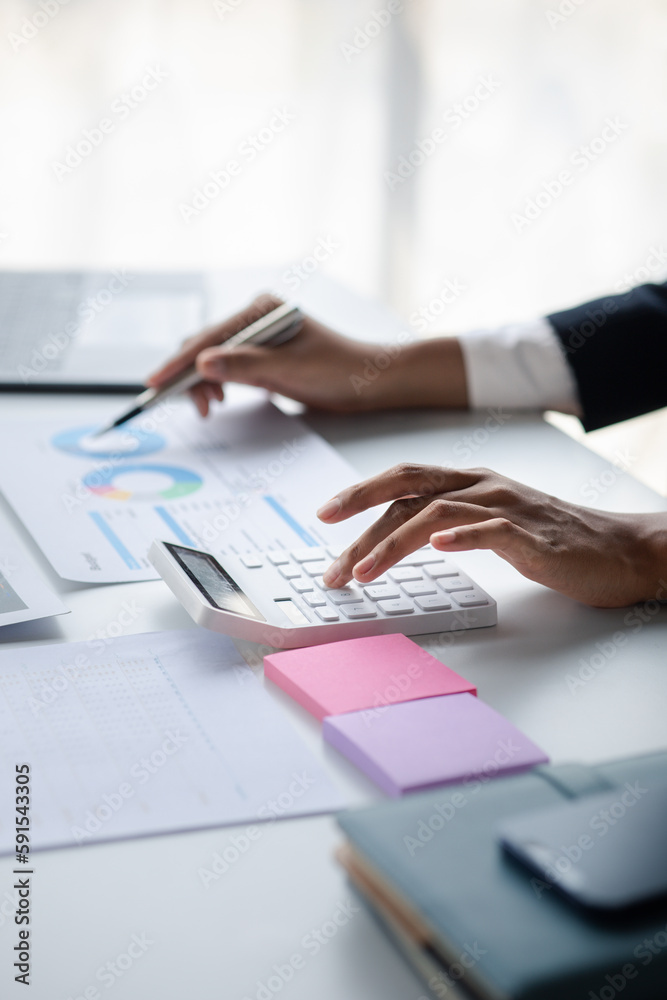 Financial accountants are checking documents from the finance department, verifying company financial figures for accuracy and not to be fraudulent. Concept of corporate financial auditing. Financial accountants are checking documents from the finance department, verifying company financial figures for accuracy and not to be fraudulent. Concept of corporate financial auditing.