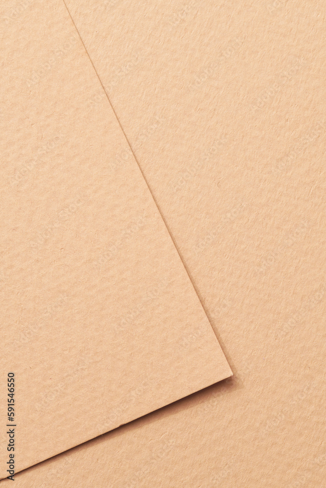 Rough kraft paper pieces background, geometric monochrome paper texture beige color. Mockup with copy space for text Rough kraft paper pieces background, geometric monochrome paper texture beige color. Mockup with copy space for text