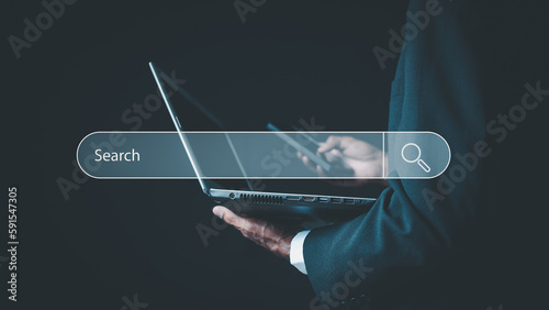 Searching Browsing Internet Data Information with blank search bar. business people working with computer and mobile for finding data.