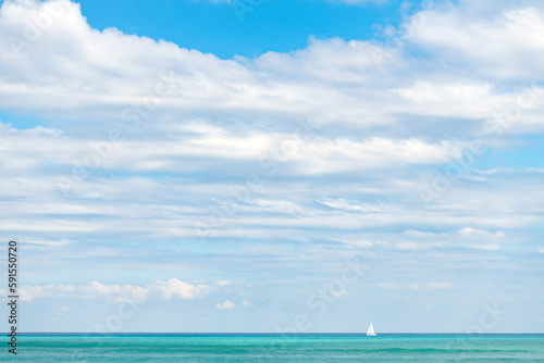 horizon view of daylight sky and summer yacht