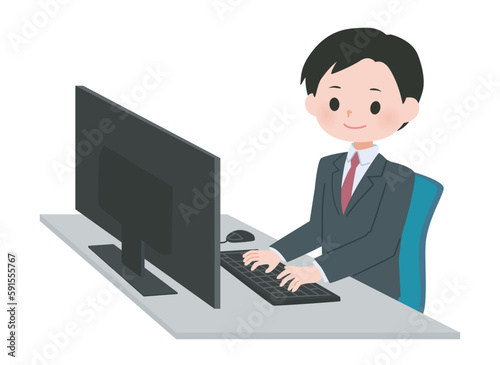 パソコンを操作するスーツの男性