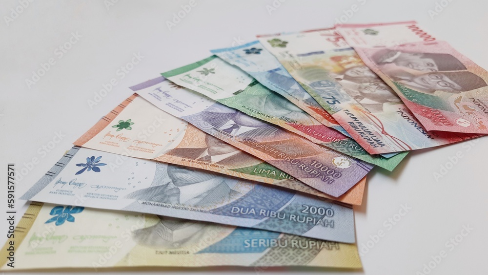 Indonesia banknotes paper money rupiah new series. Indonesian currency IDR for payments and buying and selling isolated on white background Indonesia banknotes paper money rupiah new series. Indonesian currency IDR for payments and buying and selling isolated on white background