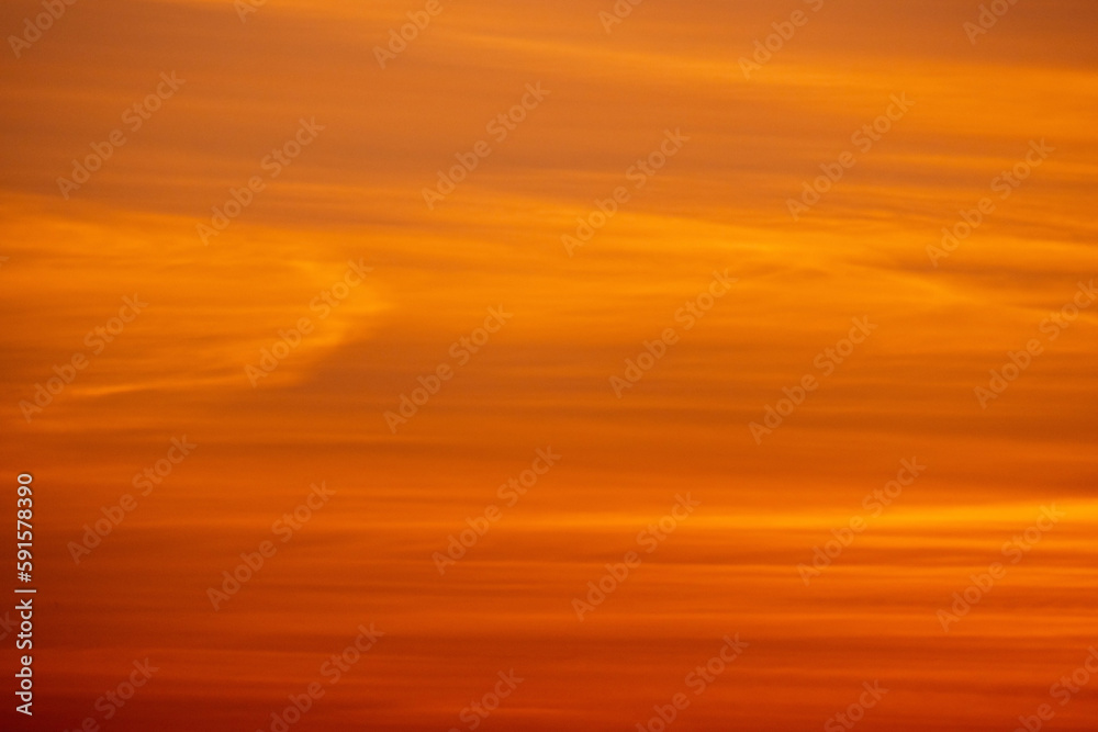 Red cloudy tropical sky on a sunset, background photo