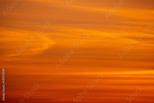 Red cloudy tropical sky on a sunset, background photo