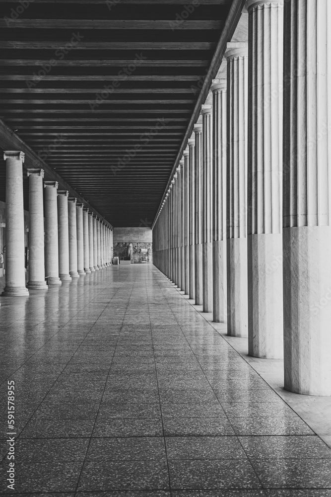 Fototapeta premium Black and white photo of Stoa of Attalos (covered walkway or portico) in the Agora of Athens, Greece. The current building was reconstructed by the american school