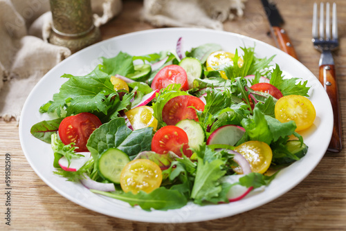 plate of salad with fresh vegetables