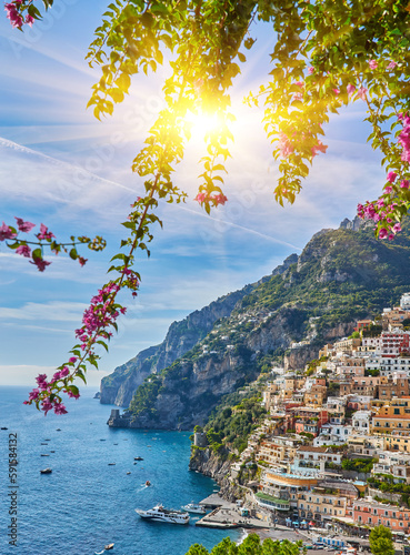 Panoramic view of Positano with comfortable beaches and blue sea on Amalfi Coast in Campania, Italy.