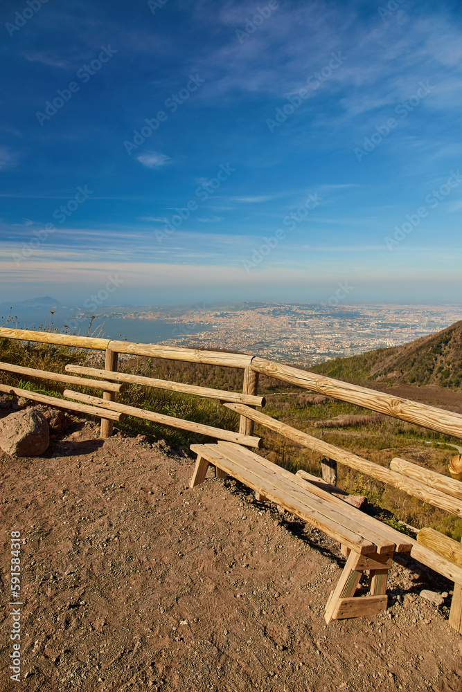 Mount Vesuv volcanic landscape and relaxing bench with aerial view for Naples, travel concept