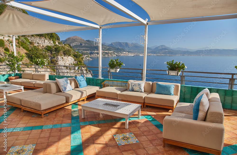 Fototapeta premium Summer outdoor cafe at old tourist european city in Italy on Amalfi coast
