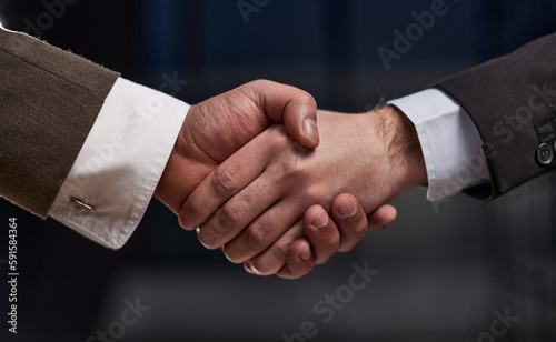 business people handshake over wooden table. businessmen agreement and partnership concept.