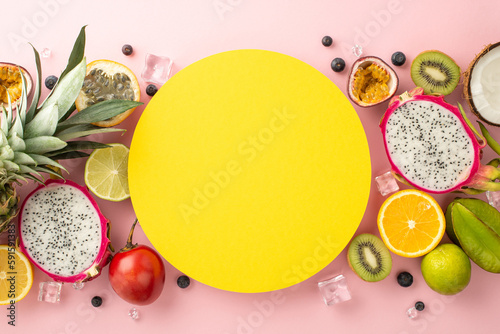 Fruity heaven. A vibrant top view flat lay of tropical fruits such as dragon fruit, kiwi, papaya, pineapple, orange, lime, and coconut, on a pink background and an empty circle for advertising text