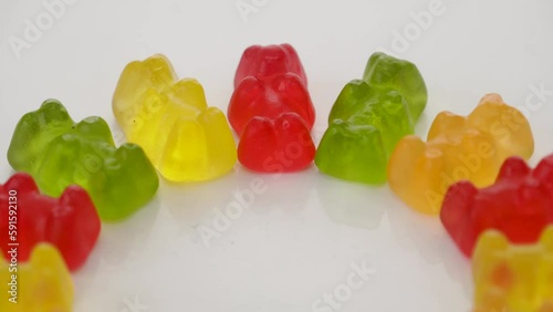 Gold bears. Animal gummy candies. Isolated on white background