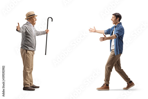 Excited senior man meeting a young man