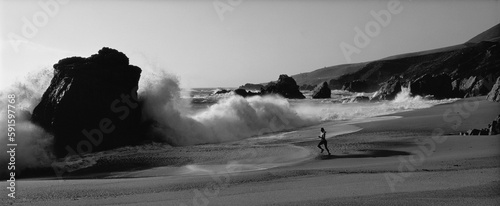 Woman Running on Rocky Beach