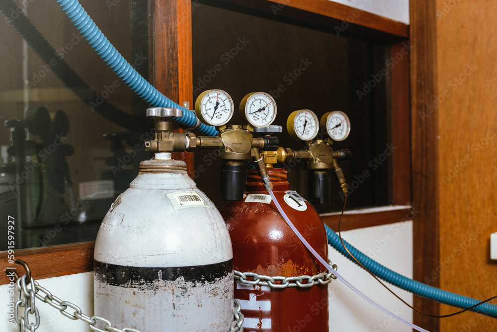 Closeup of gas tanks used for instrumental Liquid Chromatography Mass
