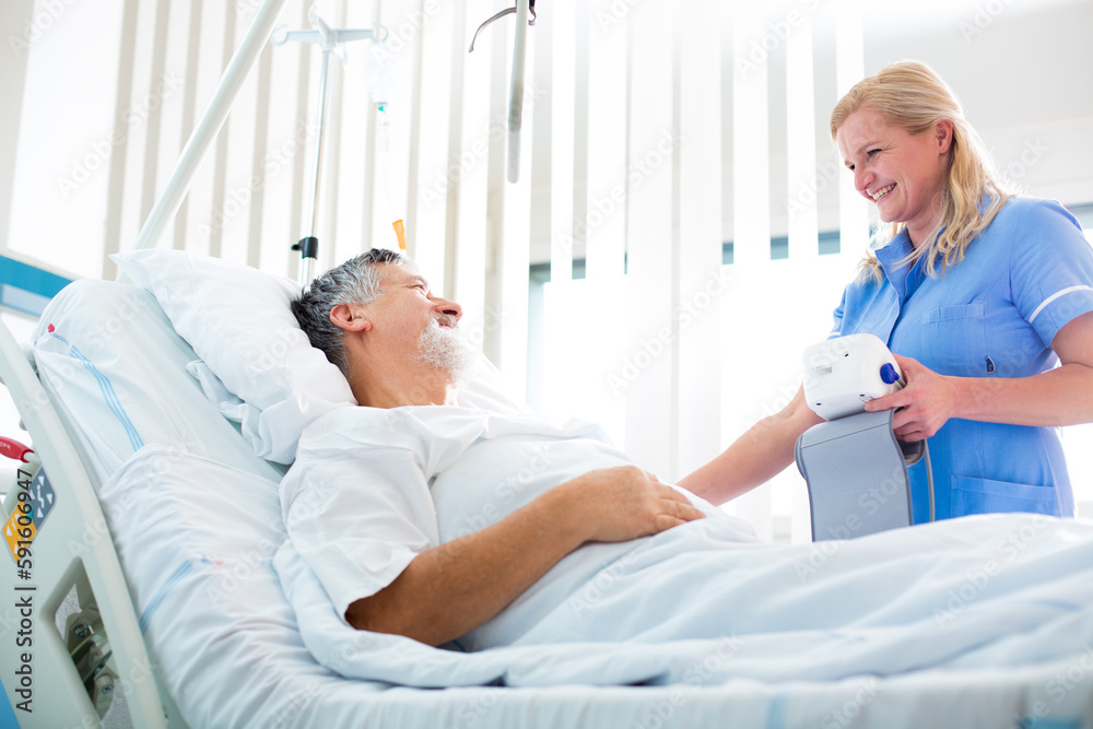Senior male patient in a modern hospital (shallow DOF; color toned image) Senior male patient in a modern hospital (shallow DOF; color toned image)