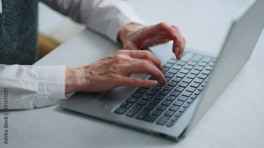 Closeup View Of Elderly Female Hands Typing Text On Modern Laptop, Old Writer Writing New Novel Closeup View Of Elderly Female Hands Typing Text On Modern Laptop, Old Writer Writing New Novel