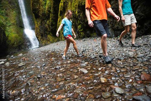 People Hiking in Oneonta Gorge, Oregon, USA