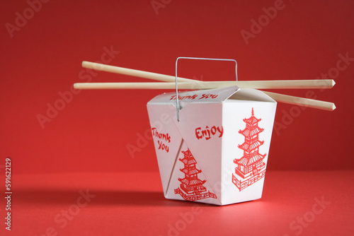 Carton of Chinese Food with Chopsticks photo