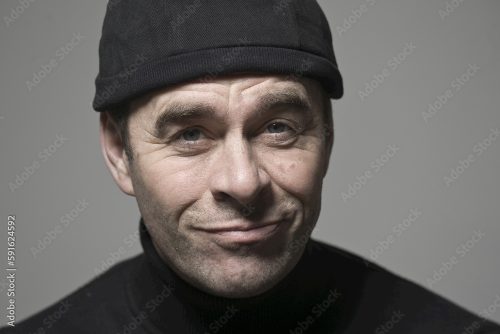 Portrait of Man in Black Cap Portrait of Man in Black Cap