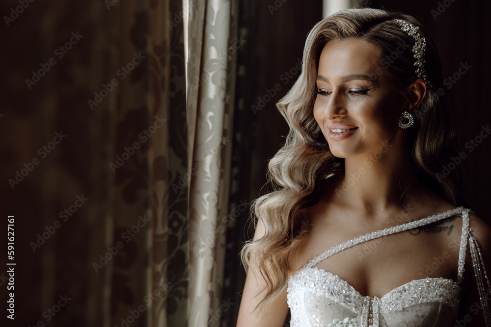 Fototapeta premium portrait of the beautiful bride in the hotel
