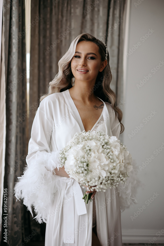 portrait of the beautiful bride, the morning of the bride in the hotel. portrait of the beautiful bride, the morning of the bride in the hotel.