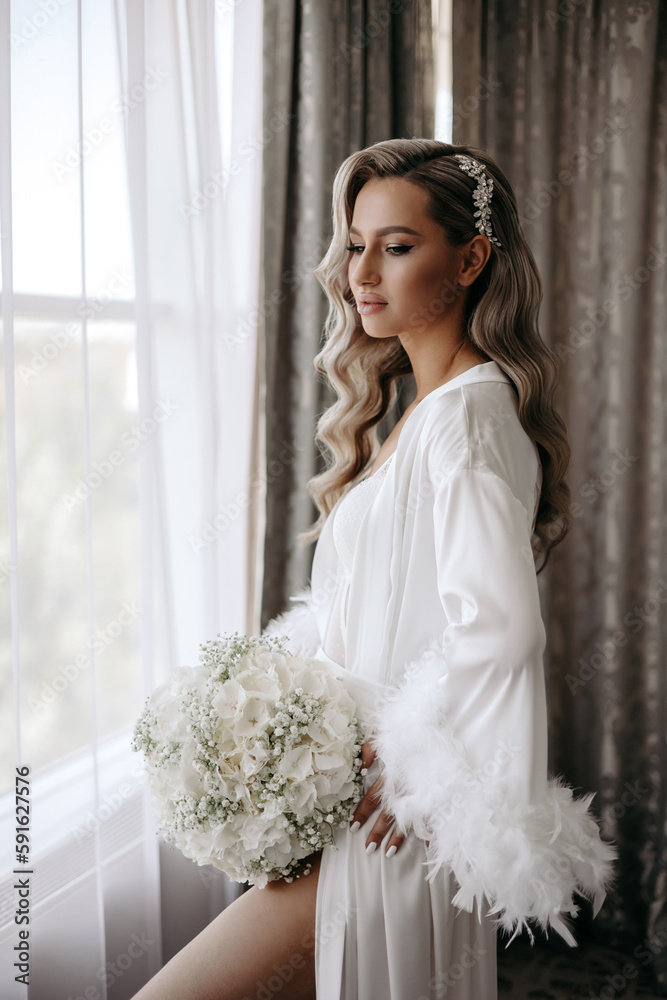 portrait of the beautiful bride, the morning of the bride in the hotel. portrait of the beautiful bride, the morning of the bride in the hotel.
