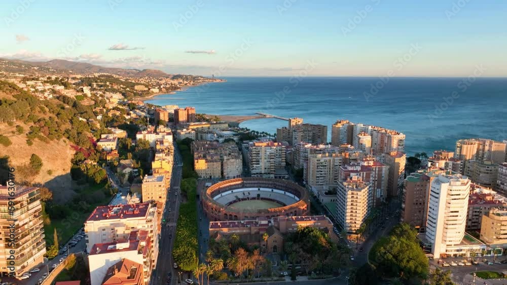 Malaga cityscape, Spain. Malaga waterfront, Plaza de Toros de Ronda bullring in Malaga, Spain.