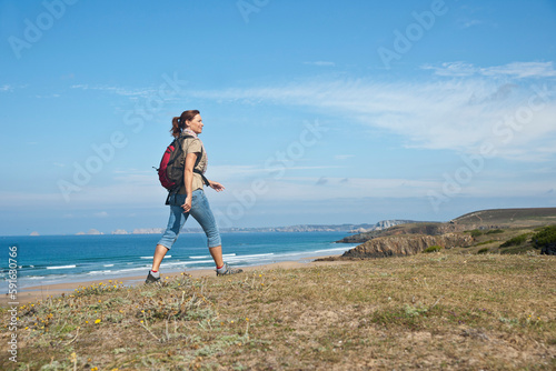 Woman on Beach, Camaret-sur-Mer, Finistere, Bretagne, France photo