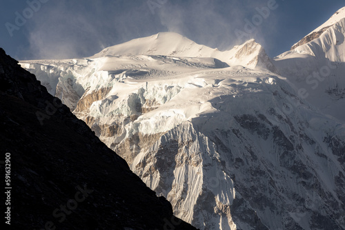 Detail of Cho Oyu (8188m) glacier being hit by strong winds. Photo taken from Gokyo village with long lens