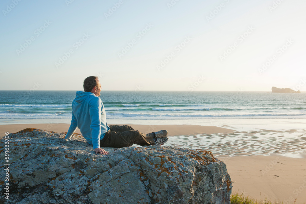 Man Looking into the Distance at the Beach, Camaret-sur-Mer, Crozon Peninsula, Finistere, Brittany, France