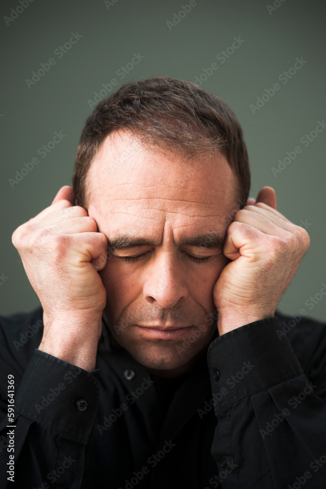 Head and Shoulders Portrait of Mature Man Eyes Closed and Fists by Head Head and Shoulders Portrait of Mature Man Eyes Closed and Fists by Head