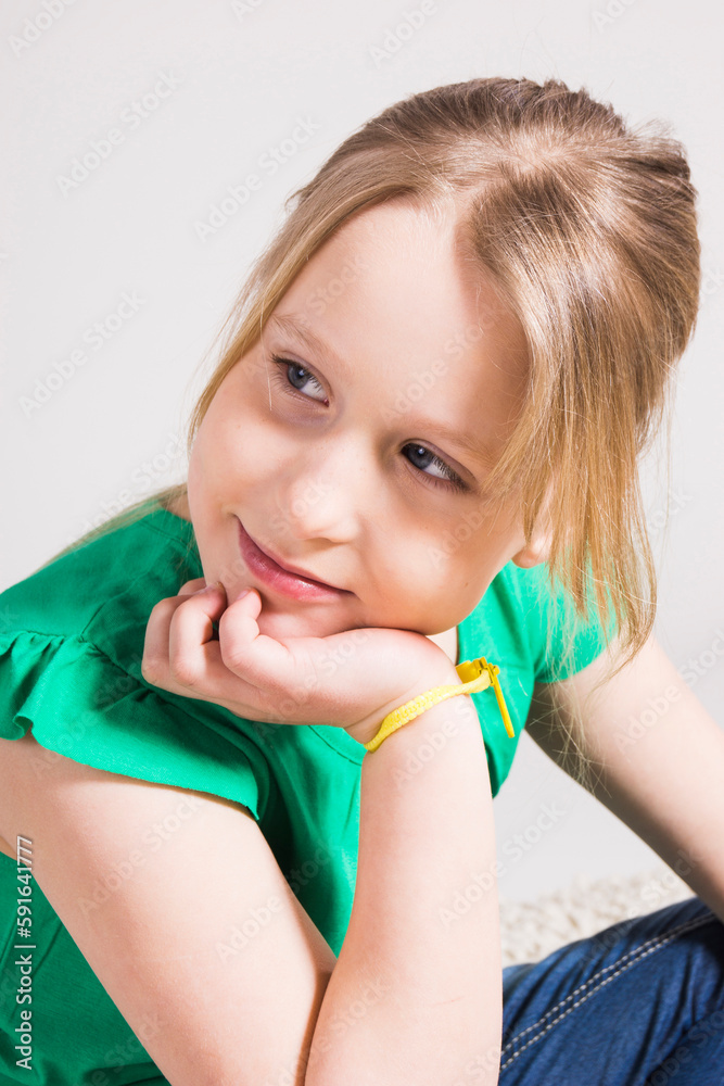Portrait of Girl leaning on Hand in Studio Portrait of Girl leaning on Hand in Studio