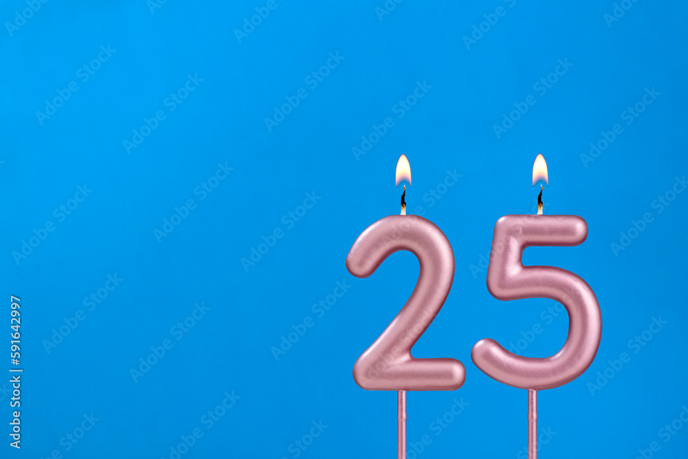 Candle number 25 - Birthday in blues foamy background Candle number 25 - Birthday in blues foamy background