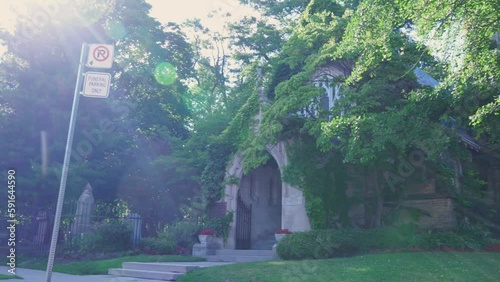 The Necropolis Chapel or Toronto Crematorium Chapel at summer, located in Cabbagetown. Heritage conservation district. Toronto, Ontario, Canada.. photo