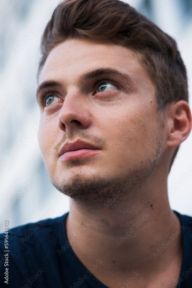 Close-up portrait of young man outdoors, Germany Close-up portrait of young man outdoors, Germany