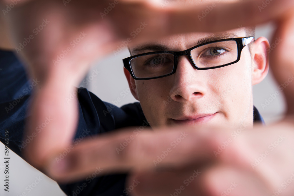 Young Man Working in Office, Mannheim, Baden, Wurttemberg, Germany Young Man Working in Office, Mannheim, Baden, Wurttemberg, Germany