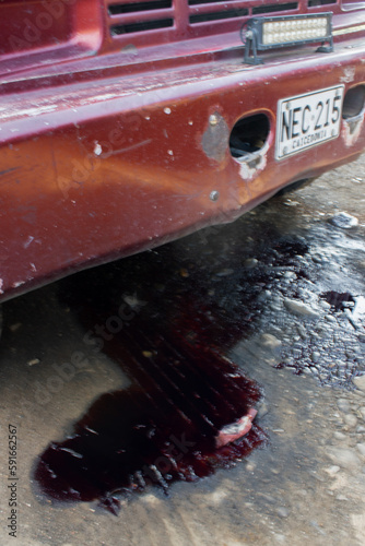 Coches destruidos y abandonados en un estacionamiento de latino por la tarde. Coches destruidos y abandonados en un aparcamiento de latino por la tarde en colombia photo