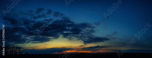 Orange sunset with clouds panorama © Олег Мальшаков
