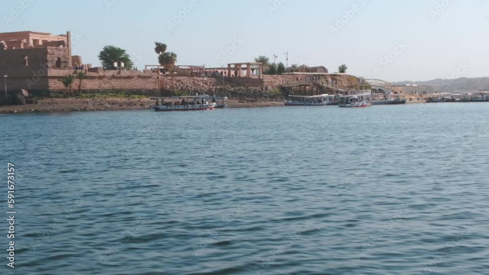 Philae temple complex ,an island-based temple complex in the reservoir of the Aswan Low Dam, downstream of the Aswan Dam and Lake Nasser, Egypt. External daylight shot Philae temple complex ,an island-based temple complex in the reservoir of the Aswan Low Dam, downstream of the Aswan Dam and Lake Nasser, Egypt. External daylight shot