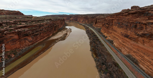 The Canyons Near Moab, Utah, with the Geologic Erosional Formations from a UAV Drone looking at the Colorado River Canyon photo