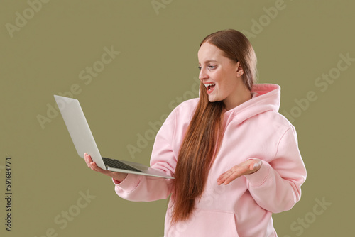 Female programmer with lapt...