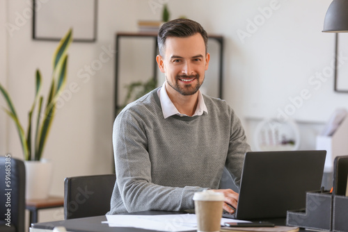 Handsome businessman workin...