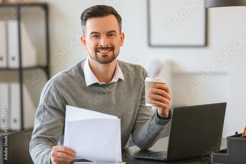 Handsome businessman workin...