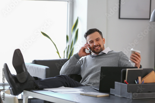 Handsome businessman talkin...