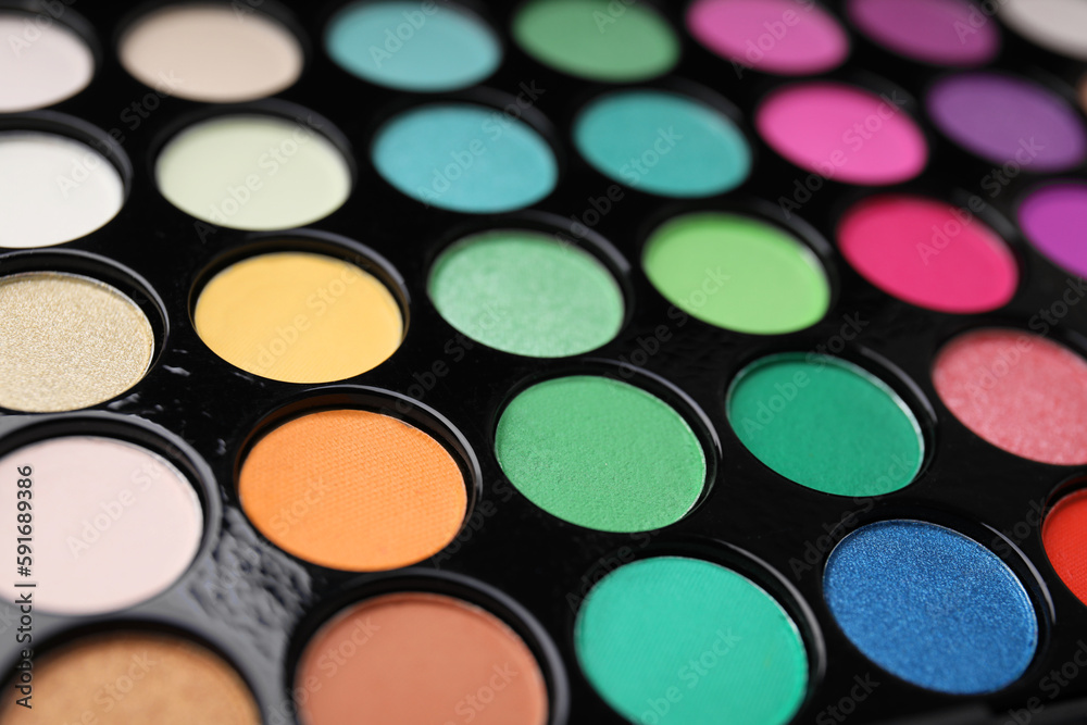 Beautiful eyeshadow palette as background, closeup. Professional cosmetic product Beautiful eyeshadow palette as background, closeup. Professional cosmetic product