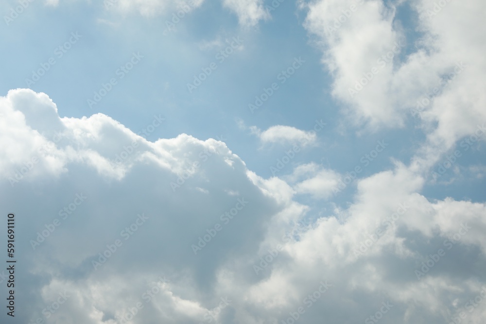 Beautiful view of blue sky with fluffy clouds Beautiful view of blue sky with fluffy clouds