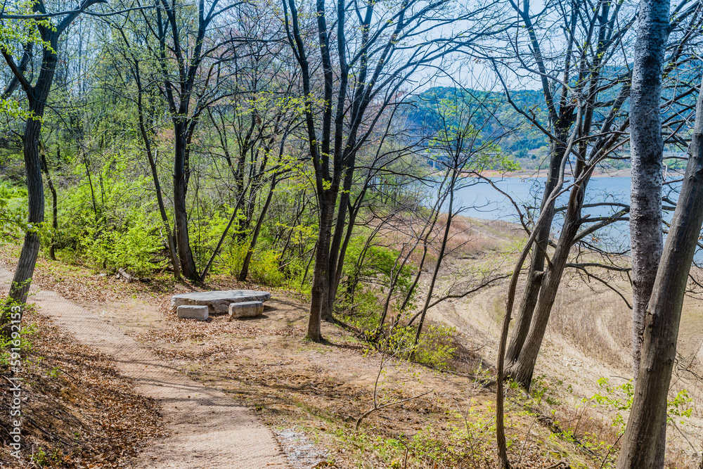 Marble picnic table at rural lakeside park. Marble picnic table at rural lakeside park.